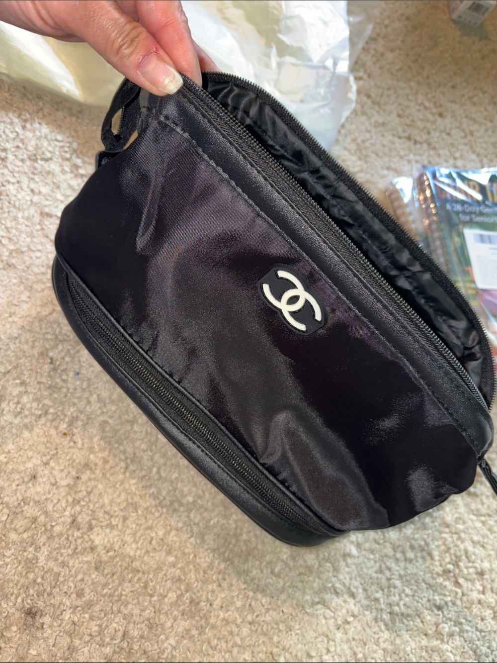 Fashion Inspired Black Satin Cosmetic Pouch with Emblem